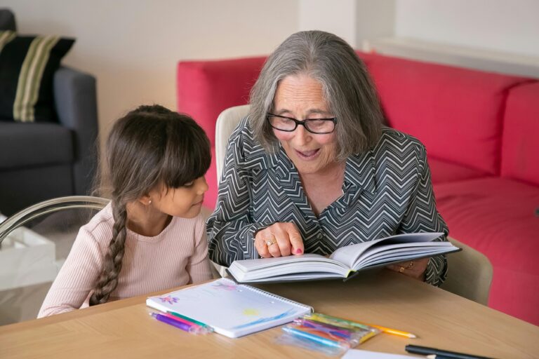 Grandma with granddaughter reading a book ‣ Raver Rawlings Law Group PLLC Grandma with granddaughter reading a book